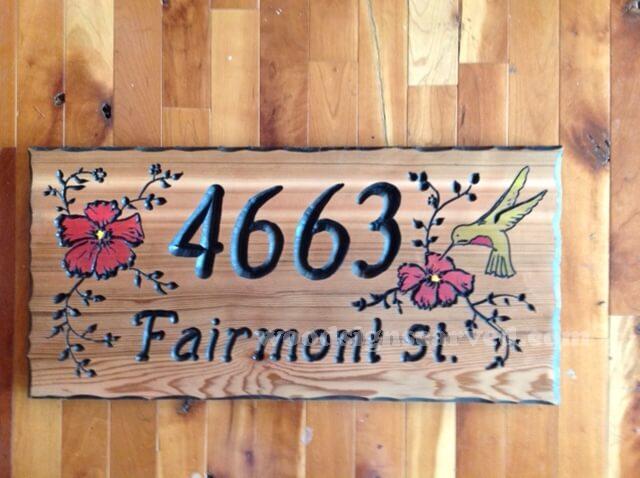 WoodPeckerCarvedSigns-1550 4663 Fairmont St - a custom carved cedar wood sign from Woodpecker Signs
