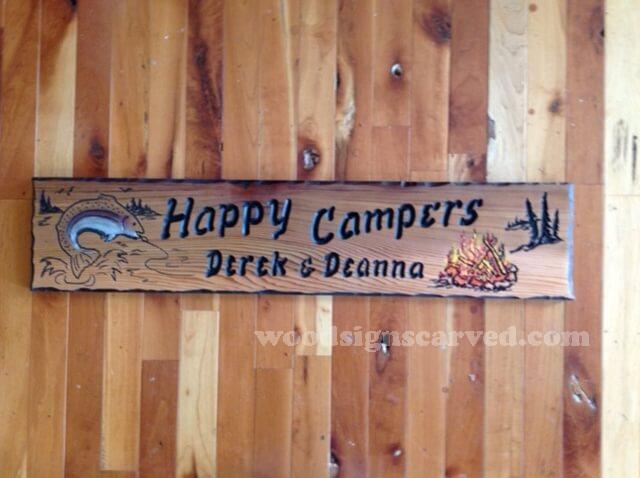 Happy Campers - a custom carved cedar wood sign from Woodpecker Signs