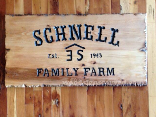 WoodPeckerCarvedSigns-1569 - 24x48 Schnell Family Farm - a custom carved cedar wood sign from Woodpecker Signs