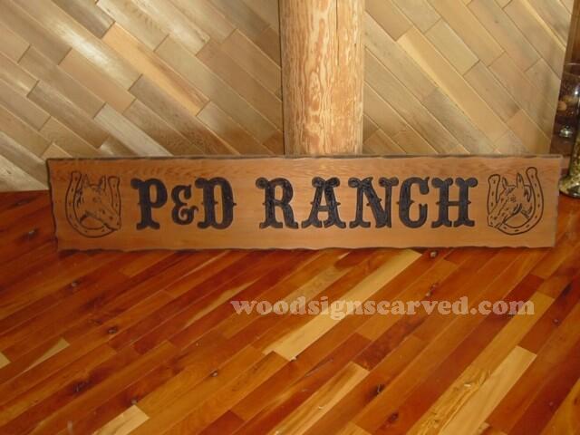 P and D Ranch - a custom carved cedar wood sign from woodsignscarved.com